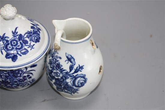 A Worcester blue and white coffee pot and cover, sugar bowl and cover and milk jug, c.1760-75 and a New Hall type teapot and cover c. 1